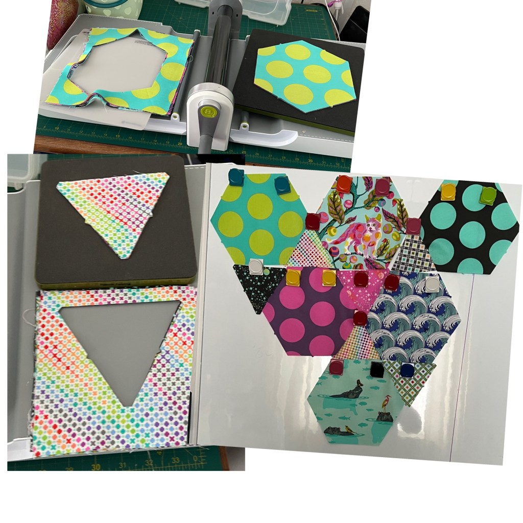 Quilting fabric pieces and die-cutting machine. The top and left photos show a die-cutting machine with colourful fabric pieces being cut into hexagon and triangle shapes using black foam dies. The fabrics have bright patterns, such as large polka dots and multicolored dots. The bottom right photo displays the cut fabric shapes arranged on a whiteboard surface, held in place with colourful magnets. The arrangement forms a pattern for a quilt, with a mix of hexagons and triangles in various vibrant prints, including dots, waves, florals, and animals. The scene suggests a creative quilting or patchwork project in progress. (Described by Be My AI with minor editing).