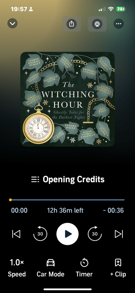 Audiobook player screen. At the top, it shows the time (19:57) and battery level (74%). The main book cover displayed features leaves, gold chains, snowflakes, and an old-fashioned pocket watch, with the title in the center: "The Witching Hour: Ghostly Tales for the Darkest Nights." Contributing authors' names are written on the leaves, including Andrew Michael Hurley, Natasha Pulley, Michelle Paver, Imogen Hermes Gowar, Kiran Millwood Hargrave, Bridget Collins, Stacey Halls, Stuart Turton, Susan Stokes-Chapman, Elizabeth Macneal, Laura Shepherd-Robinson, Jess Kidd, and Catriona Ward.

Below the cover is the title of the current section playing: "Opening Credits." The progress bar shows the audiobook is at the very start, with 12 hours 36 minutes left. Control buttons for playback, speed, car mode, timer, and clips are listed at the bottom.