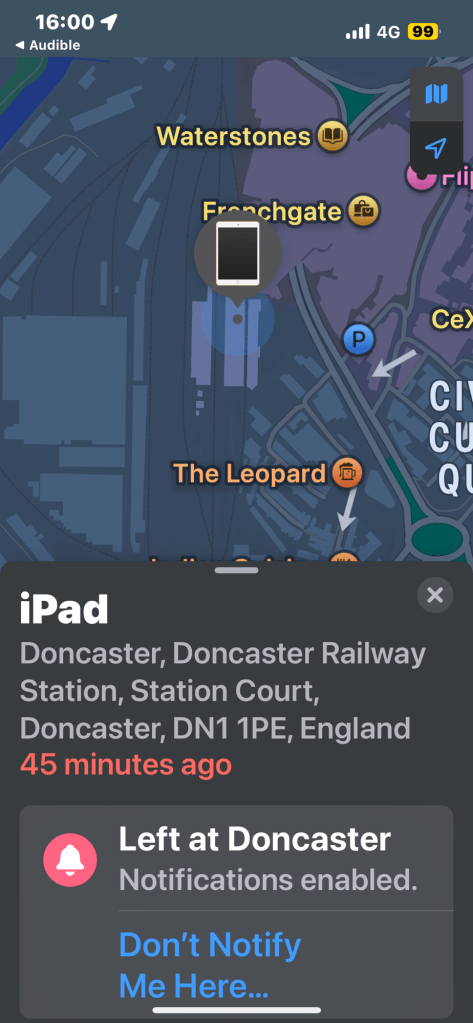 Map screenshot showing the location of an iPad at Doncaster Railway Station, Station Court, Doncaster, DN1 1PE, England. The map highlights landmarks like Waterstones, Frenchgate, and The Leopard nearby. The status indicates the iPad was last seen 45 minutes ago and that it was "Left at Doncaster," with notifications for this event enabled. There is also an option to stop notifications for this location. The time at the top is 16:00, and the device has a 4G connection with 99% battery.